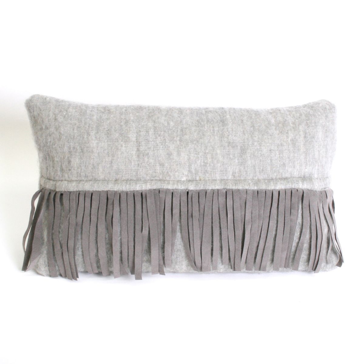 cushion light grey with suedine fringes 50x30cm